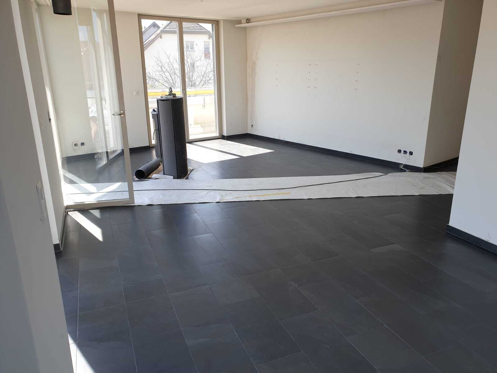 Regio Plättlileger GmbH Wohnzimmer Fliesen.jpeg